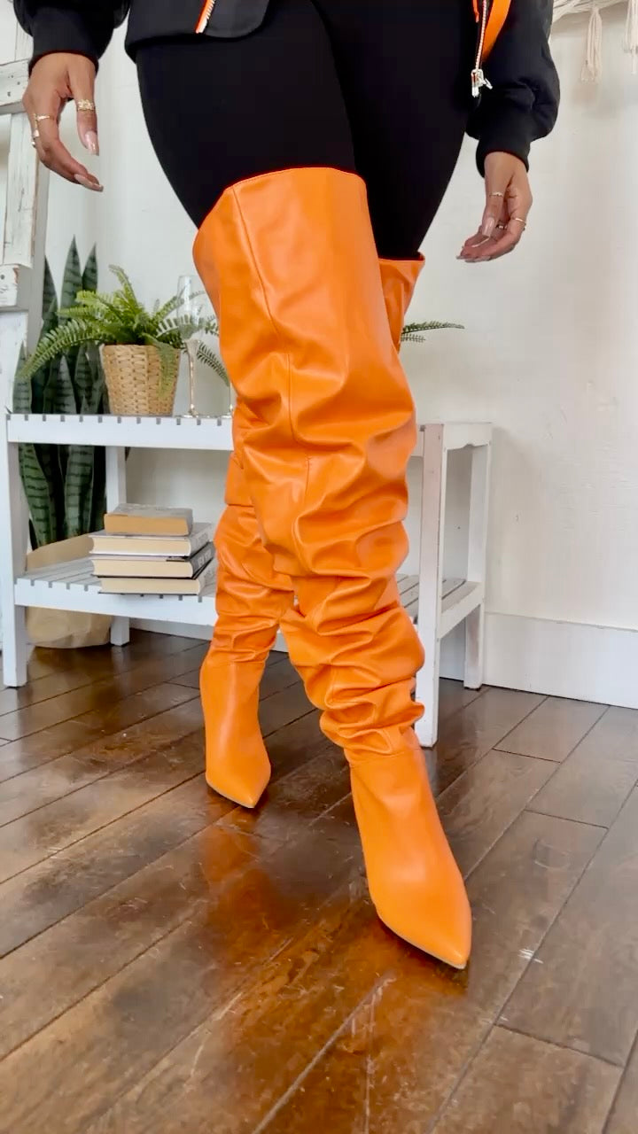 Orange thigh boots best sale